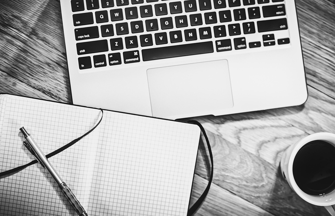 Computer, notebook, coffee — How Forex Trading With Metatrader 4 Enhances Market Analysis and Execution
